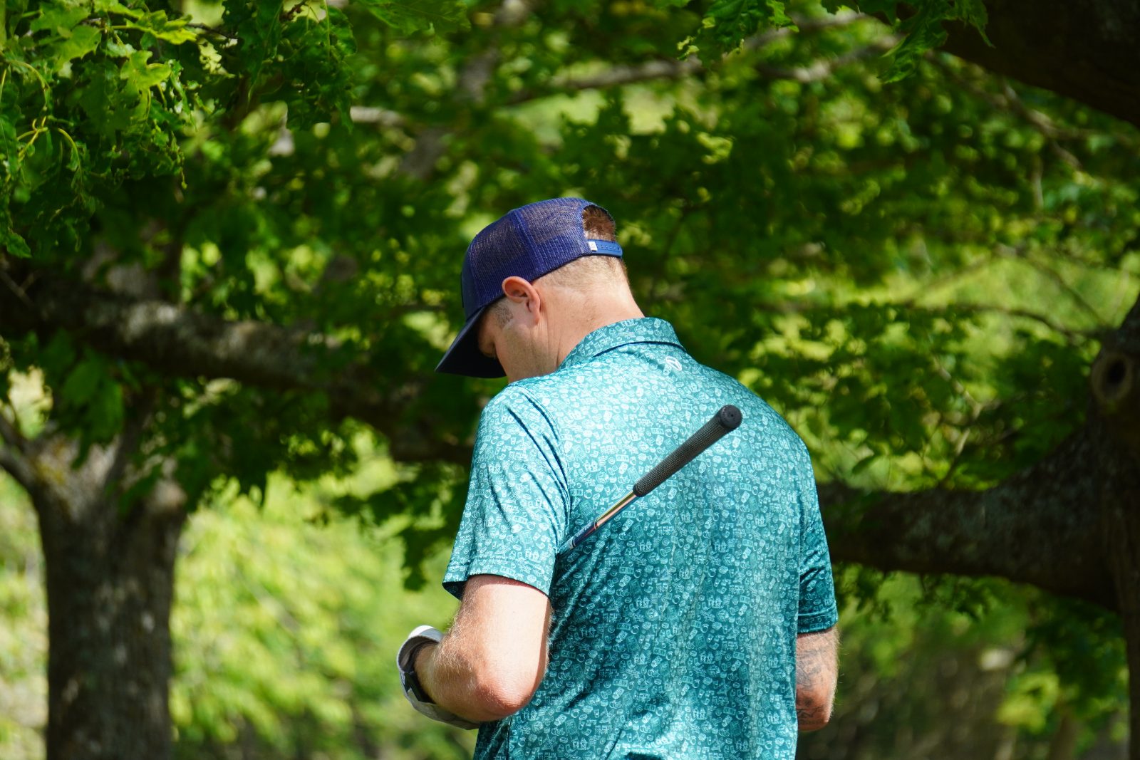Golfer close up with club